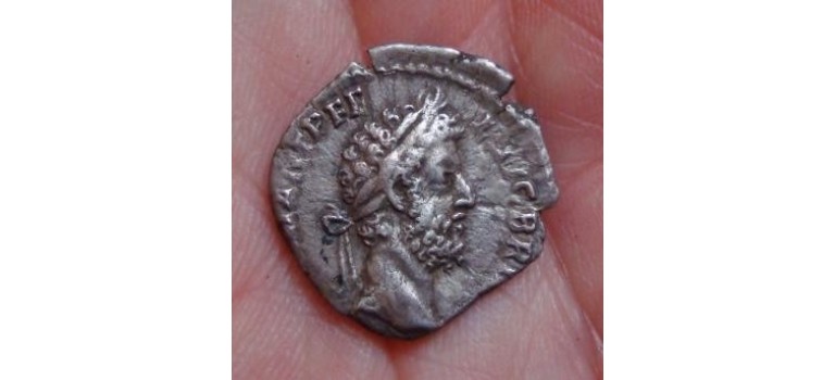 Commodus - commodus seated on a curule chair